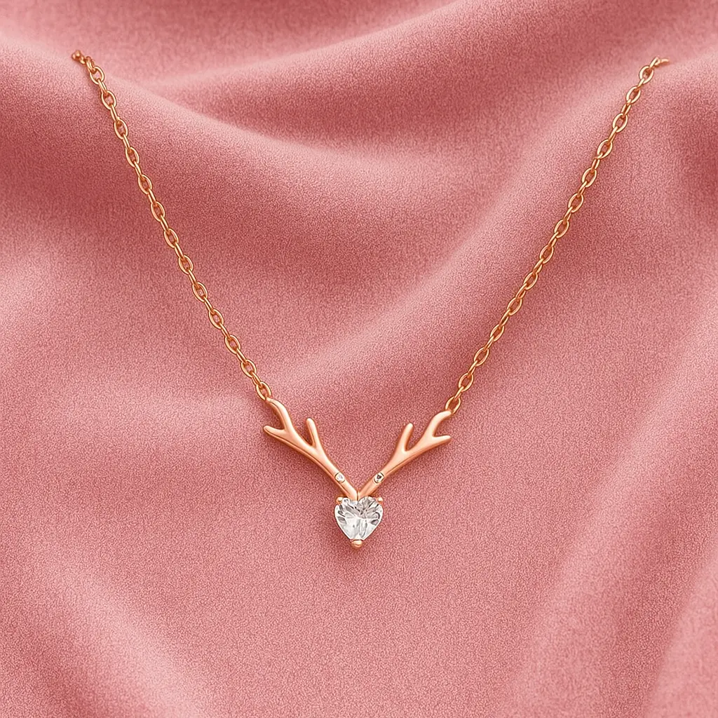 Make a bold and romantic statement with this rose gold antler necklace, adorned with a dazzling heart-shaped diamond. Set against a plush pink velvet background, it’s the perfect blend of whimsy and luxury. Ideal for gifting and special celebrations. Keywords: Rose gold necklace, heart diamond pendant, antler jewelry, romantic gifts, pink velvet necklace display